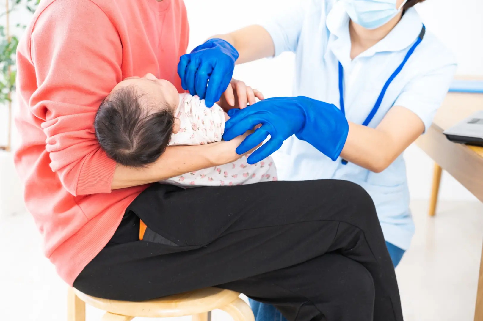 A postnatal review at an Aurora consultation.
