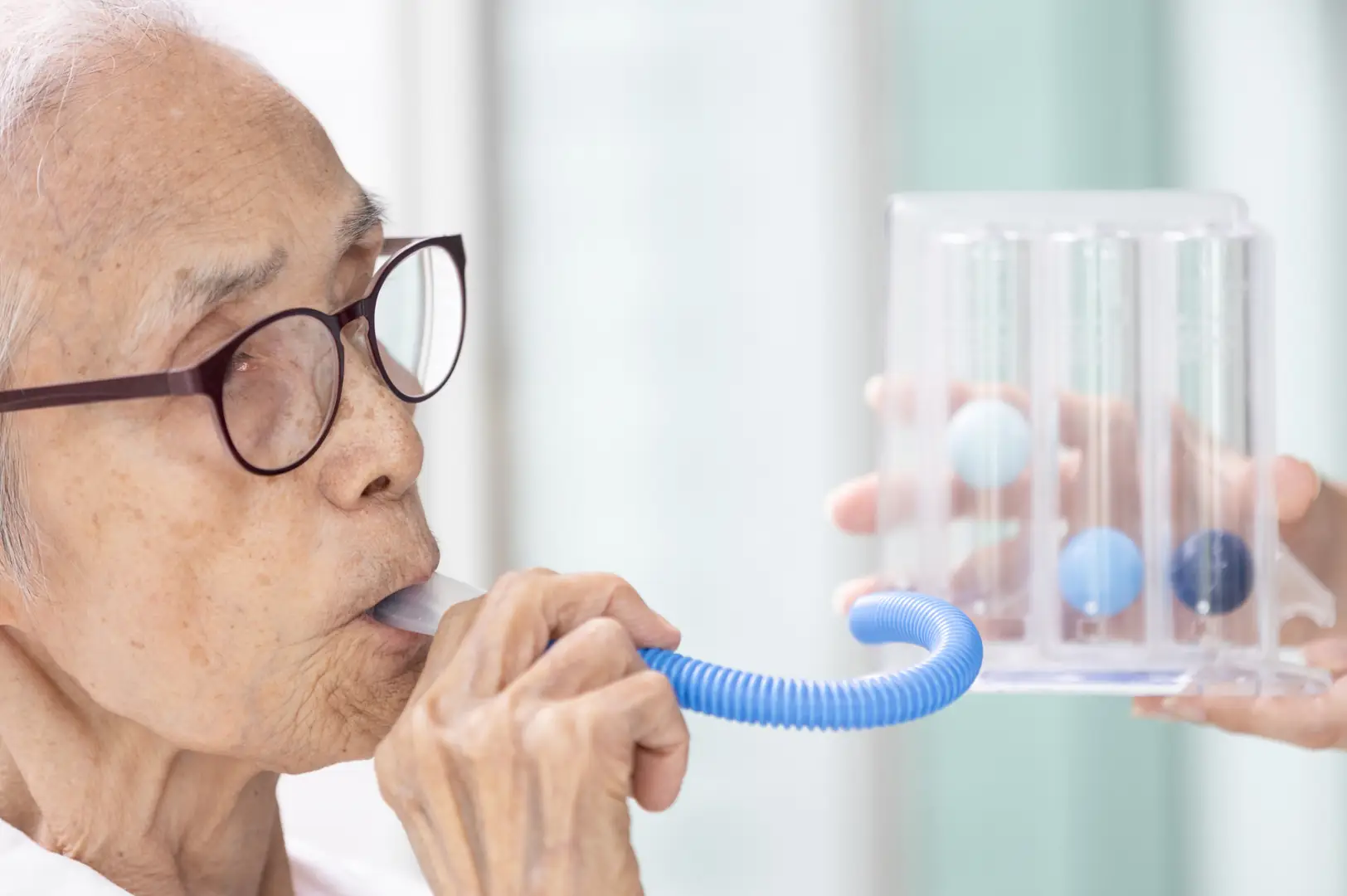 A spirometry test during a respiratory review.
